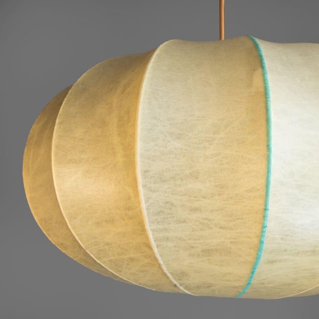 Cocoon Pendant Lamp, 1960s, in Good conditions. Designed 1960 to 1969 Up to 250V (Europe/UK Standard).The wiring of this...