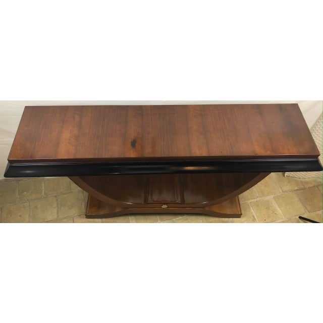 A very good quality pair of French Art Deco console tables in a modern designed “U” shape attributed to Alfred Porteneuve,...