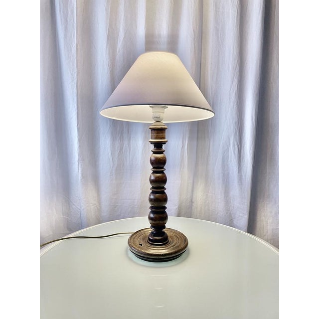 Hand-turned oak table lamp. France circa 1940/1950. Rustic, chalet style, Mid Century, Dudouyt. European Plug (up to...