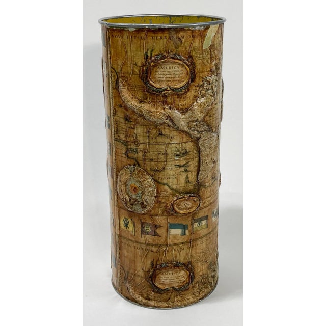 Vintage metal umbrella stand or waste basket featuring detailed raised relief decoupage world map. Includes maps to...