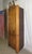 Early American solid cherry corner cabinet. A broken arch pediment and the original finish lend a classic air to this...