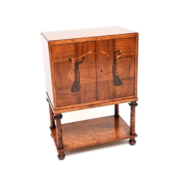 An absolutely stunning Swedish Art Deco inlaid cabinet. This was recently imported from Sweden, it dates from around the...