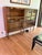Mid Century Danish Glassfront Bookcase A narrow mid-century modern cabinet or bookcase with sliding glass door front and...