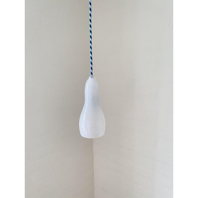 Pendant Lamps in White Opal Glass from Holmegaard, 1960s, Set of 2, in Flawless conditions. Designed 1960 to 1969 This...