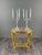 An elegant pair of three-light candelabra, resting on a finely molded, scalloped base. The sinuous, scrolled arms evoke...