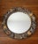 Beautiful vintage round wall mirror by La Barge featuring a hand-carved and hand-painted wood frame richly adorned with...