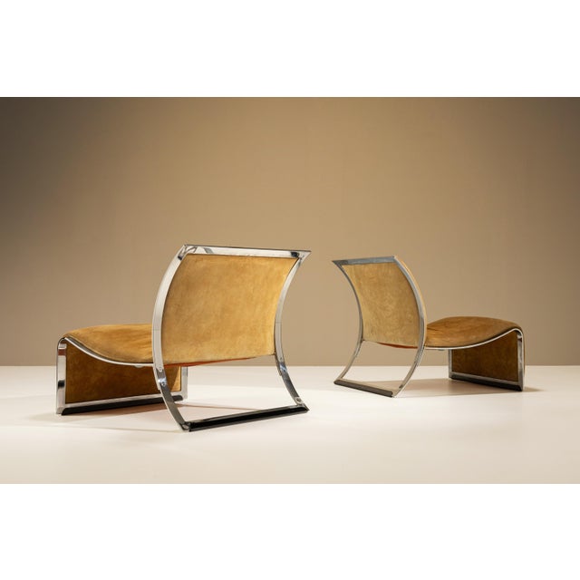 This set of lounge chairs is attributed to Vittorio Introini and follows the low, sculptural seating forms associated with...