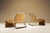 This set of lounge chairs is attributed to Vittorio Introini and follows the low, sculptural seating forms associated with...