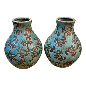 Vintage Pair of Carved Pottery With Foliate Design