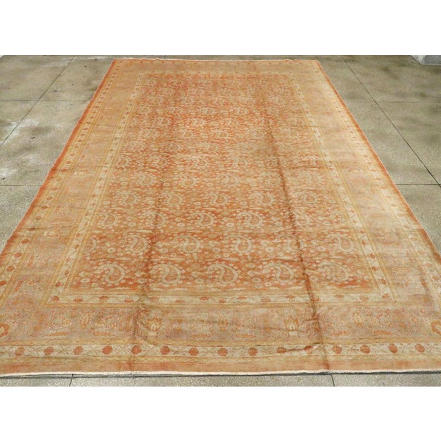 An antique Turkish Oushak large room size carpet handmade during the early 20th century. Measures: 10' 8" x 15' 11"