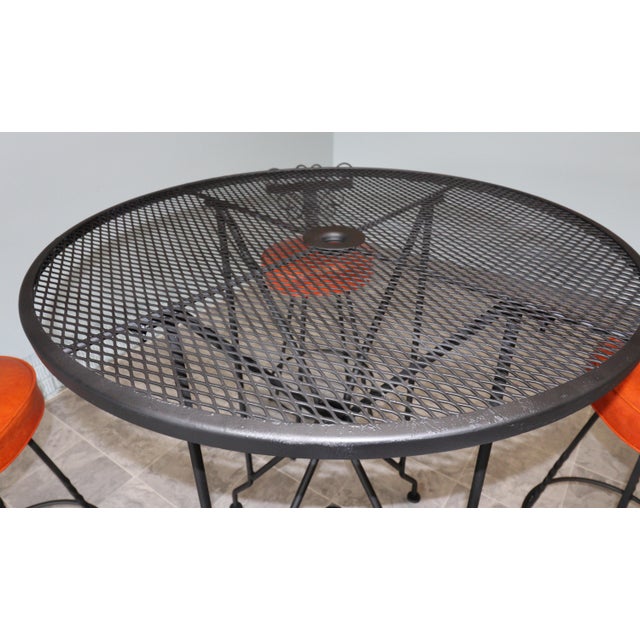 Vintage Spanish Revival Wrought Iron Swivel Bar Stool Set With Matching Mesh Bar Table & Heavy Umbrella Stand – Mid-Century, Orange Vinyl For Sale - Image 11 of 12