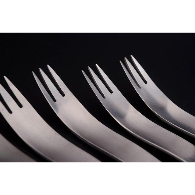 Arne Jacobsen for Anton Michelsen, set of six dinner forks. Set of six stainless steel dinner forks featuring Arne...