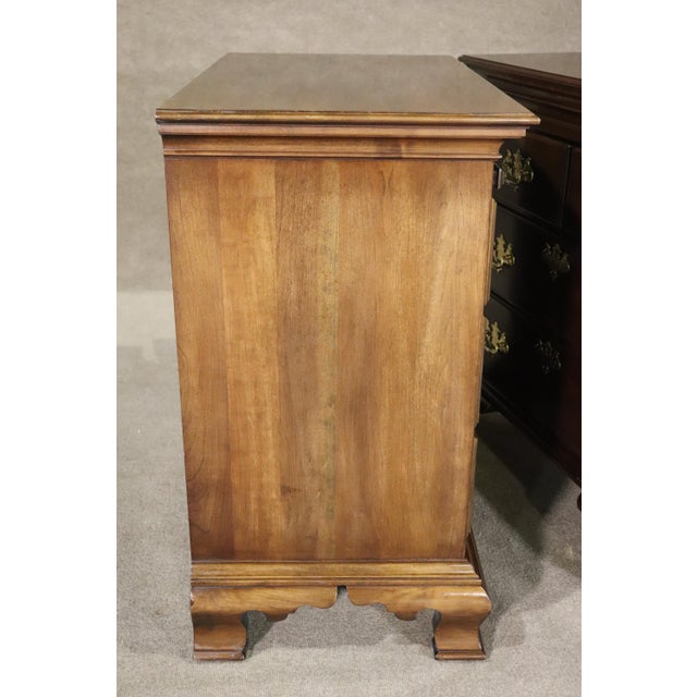 Pair of vintage dressers with four drawers each and pull out shelf. Antique brass hardware on cherry wood. Great for...