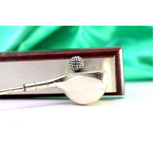 Silver Golf Club and Ball with Wooden Handle and Plated Base, in Very Good conditions. Designed 1980 to 1989 This piece...