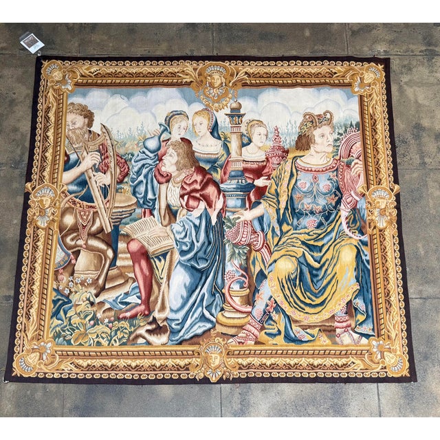 This richly detailed vintage European-style tapestry presents an elaborate Renaissance-inspired court scene filled with...