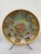 Design Plus Gallery presents a Glass Plate with Medieval Scenes + Stainless Steel Stand. The plate has a golden rim with...