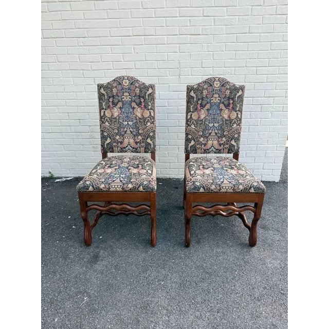 Vintage French Style Hand Pegged Mutton Leg Tapestry Upholstery Chairs. These tall dining chairs with arched backs are...