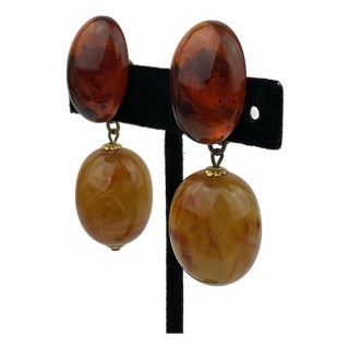 1970s Retro Lucite Amber Orange Oval Dangle Earrings, A Pair For Sale