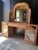 Vintage bamboo dressing table with 2 side cupboards with shelving and brass handles and central drawer The mirror has 2...