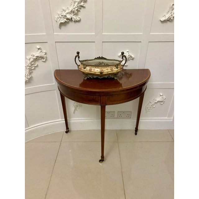 A fine late Victorian antique fold-over card table beautifully crafted in richly figured mahogany with delicate satinwood...