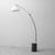 Floor lamp made in the 1980s. Metal frame. Arm adjustable in height and/or length. Features dual lighting. One inside the...
