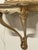 Pair of wall-mounted console tables with matching mirrors and integrated sconces, made in the 1940s in the Baroque/Louis...