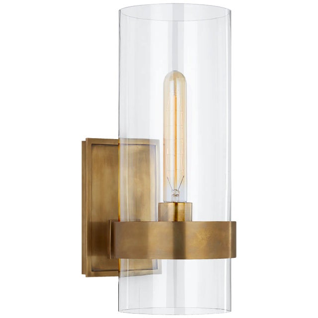 Presidio Small Sconce in Hand-Rubbed Antique Brass with Clear Glass Designer: Ian K. Fowler Height: 14" Extension: 7.75"...