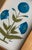 This beautiful blue floral motif painting draws inspiration from the iconic designs of Jaipur, India, seen gracing the...