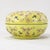 This exquisite large porcelain covered box features a vibrant yellow-ground finish, a color traditionally associated with...