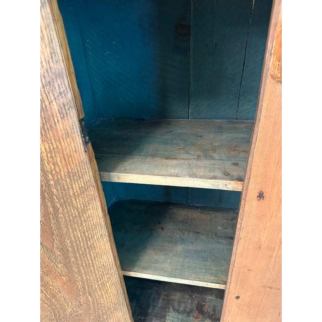 This rustic antique yellow pine jelly cupboard brings authentic farmhouse charm and warmth into any room. Crafted from...
