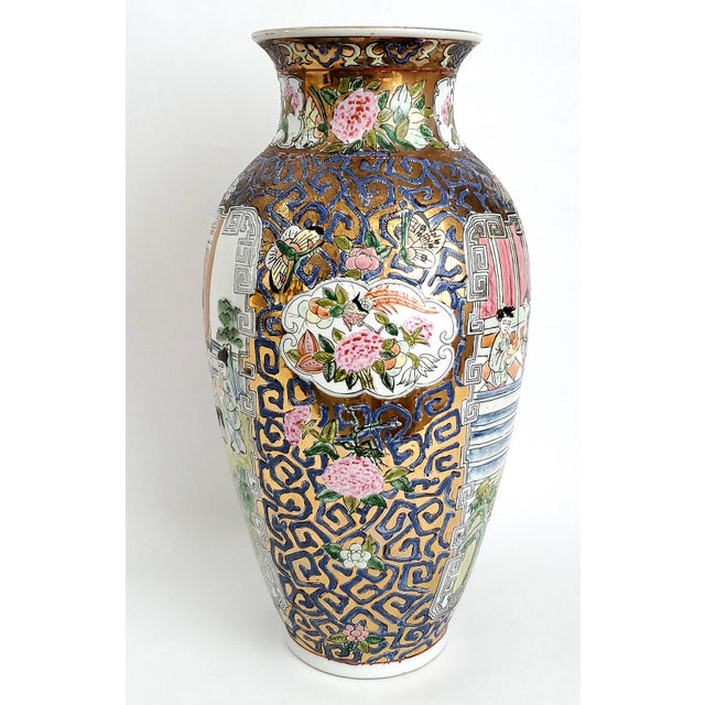 Offering a large vintage Chinese ceramic vase with hand painted scenes and Rose Medallion design, circa Early-Mid 20th...