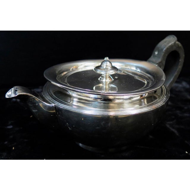 This vintage squatty silver plate tea pot is circa 1920 & designed to accommodate two tea servings. This "tea for two"...