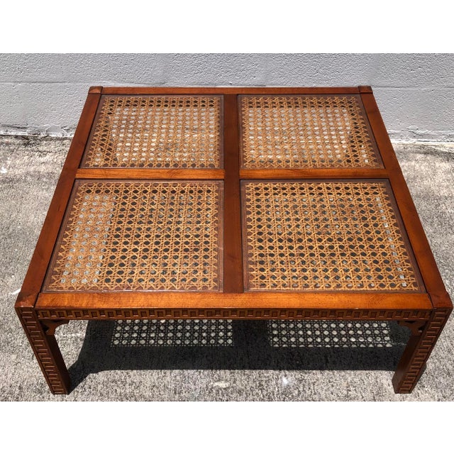 Beautiful vintage mid century modern wood fretwork cane and glass coffee table. Just gorgeous! Circa 1970s. Made in the...