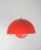 Flowerpot ceiling lamp, designed by Verner Panton (1926-1998) VP1 in orange color from the 1970s. This piece is attributed...
