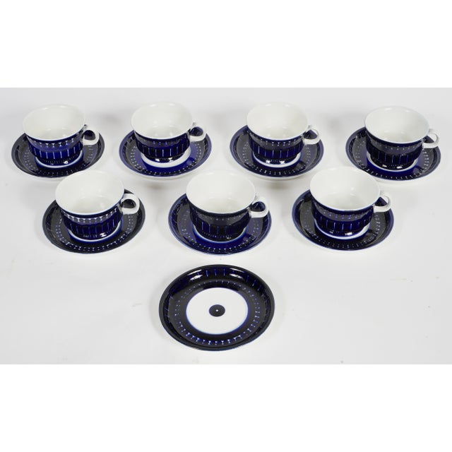 The image displays a set of vintage Arabia Finland "Valencia" teacups and saucers designed by Ulla Procopé. Designer: Ulla...