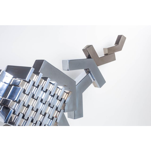 Cubist Sculpture in Mirror Polished Chrome Striking Cubist-style mirror in polished chrome on plinth base. This sculptural...