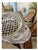 A sculptural 1981 Arthur Court fish bowl, combining functional serveware with the whimsical, nature-inspired design...