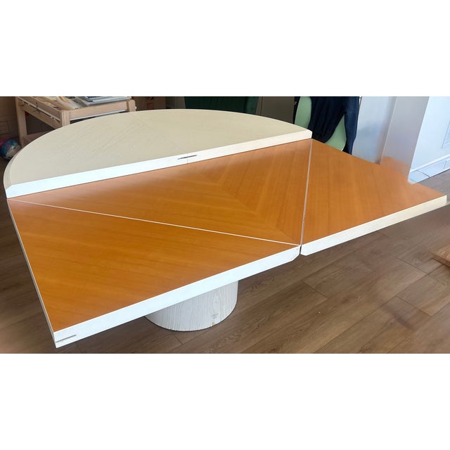 Original owner. This table was purchase in 1990. The Quadrondo is a transformable dining table that seamlessly shifts...
