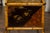 An English bamboo Canterbury from the early 19th century, with embossed leather and Chinoiserie motifs. Born in England at...