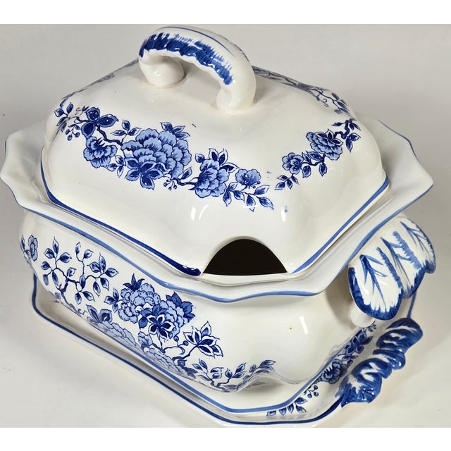 This is a very old, if not the oldest delft/ chinoiserie design. Flow blue color on white in an ornately and timeless...