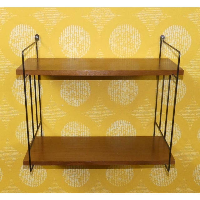 An absolute classic! Simple Swedish design A design classic in a beautiful finish This shelf is a reproduction of the...