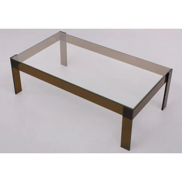Very nice simple Design this coffee table, smoked acrylic glass frame and comes with the original Glass top, fitting...
