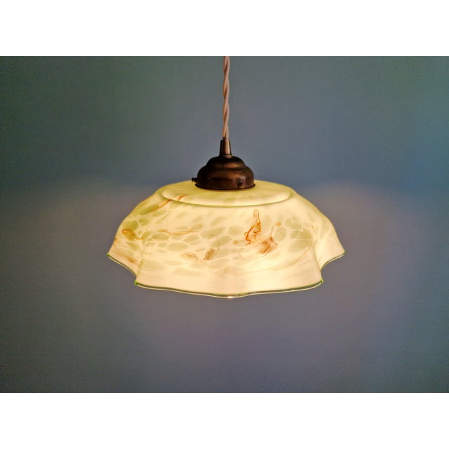 Art Deco pendant light from the 1920s-30s in light green marbled opaline glass with red veining. Fully rewired while...