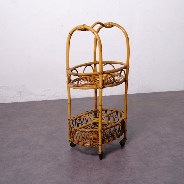 A delightful vintage liquor cart dating back to the late 1950s. You can use this furnishing accessory to hold your...