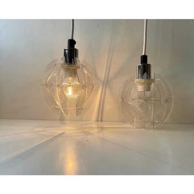 A pair of midcentury ceiling lights designed by Paul Secon and manufactured by Sompex in Germany during the 1960s or 70s....