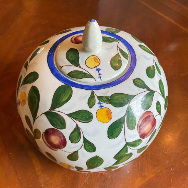 Hand painted plum design ginger jar with lid. Commonly produced in China, often featuring a "Zhongguo Zhi Zao" stamp on...