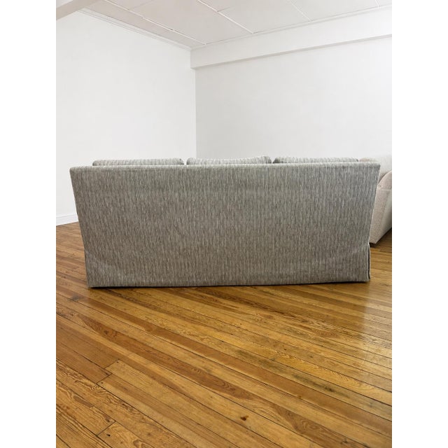 Kravet Tailor Sofa - solid maple frame. A classic style featuring rolled arms, skirted bottom and 3 back pillows....