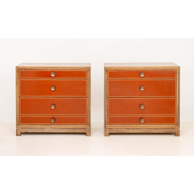Pair of Tommi Parzinger for Charak Modern Chest of Drawers, circa 1950, mahogany with burnt orange leather wrapped drawers...