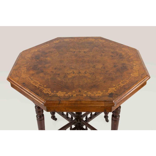 Octagonal wooden coffee table realized in Italy in the early 20th Centuey. Very good condition.
