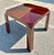 This sophisticated vintage lacquered inlay game table exemplifies the refined modernist aesthetic of the mid-20th century....